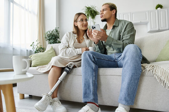 Two friends enjoy each other while chatting and laughing together.