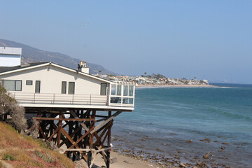 Charming Coastal Beach House with Ocean Views from Cliff