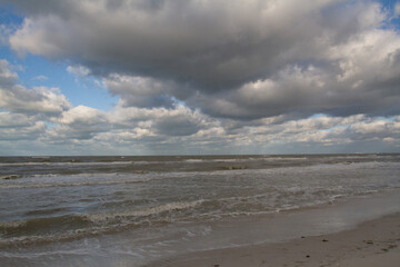 clouds over the beach