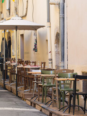 Empty chairs in a restaurant in Villefranche-sur-Mer, France