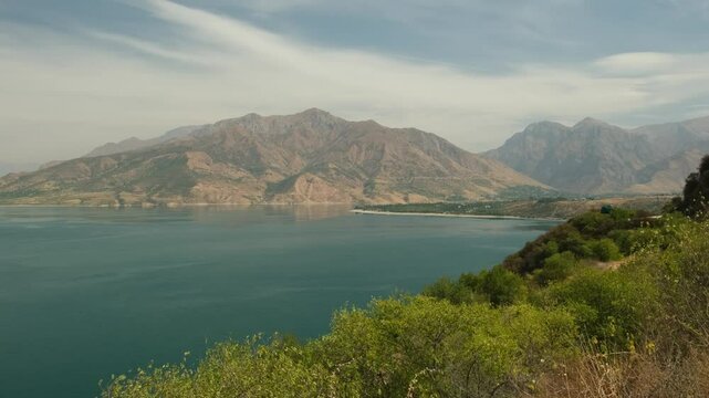 Charvak reservoir and mountains on the horizon