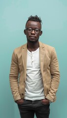 Obraz premium Innovative Tech Entrepreneur Portrait in Casual Blazer Against Light Blue Background