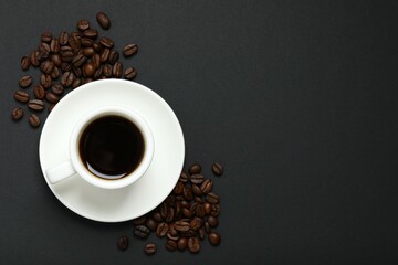 Cup of coffee on black background