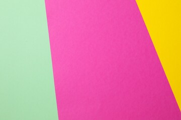 Abstract paper geometric colored background, top view and flat lay