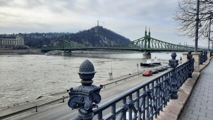 Budapest, Hungary, 02.15.2024,  embankment overlooking the Freedom Bridge over the Danube on a winter day