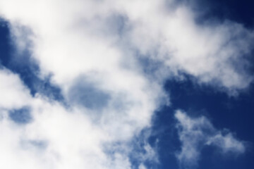 Obraz premium sky, clouds, cloud, blue, nature, weather, white, storm, cloudscape, heaven, cloudy, summer, sun, air, day, light, wind, atmosphere, rain, dark, backgrounds, time lapse, dramatic, clear