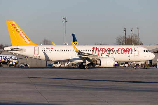 Pegasus Airlines Airbus A320 neo pushing back at airport.