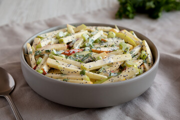 Homemade Fall Apple Slaw Salad in a Bowl, side view.