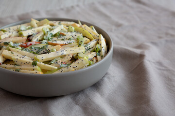 Homemade Fall Apple Slaw Salad in a Bowl, side view.