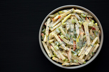 Homemade Fall Apple Slaw Salad in a Bowl, top view. Flat lay, overhead, from above. Copy space.