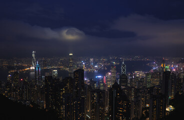 Hongkong China 11.7.2023. Hongkong bay night cityscape skyline