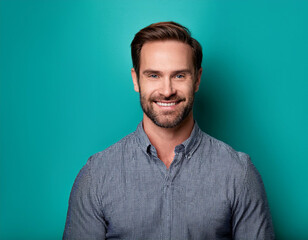 Fototapeta premium Happy Man Smiling Against Colorful Studio Background