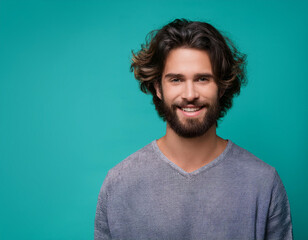 Obraz premium Happy Man Smiling Against Colorful Studio Background