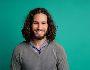 Obraz premium Happy Man Smiling Against Colorful Studio Background