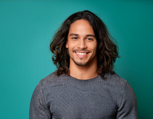 Obraz premium Happy Man Smiling Against Colorful Studio Background