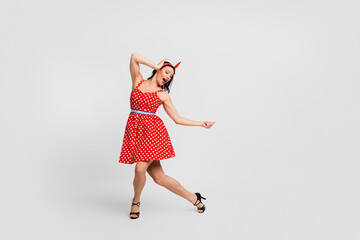 Full body photo of attractive woman boogie woogie enjoy holiday dressed red vintage style polka dot...