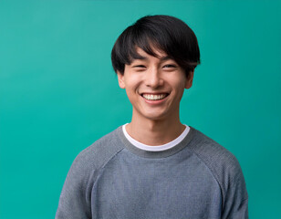 Happy Man Smiling Against Colorful Studio Background