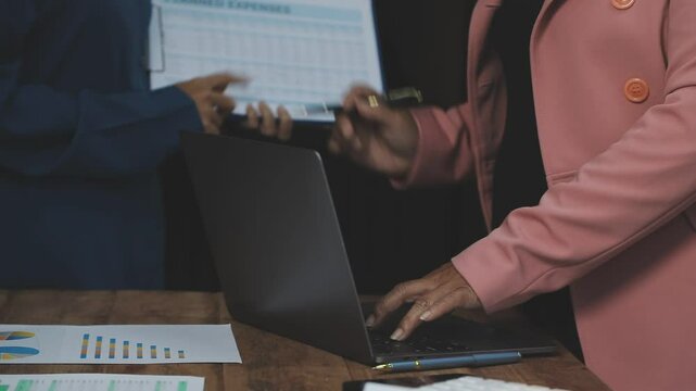 Meeting with financial advisors to analyze production costs and analyze marketing charts in business reports and adjust investment strategies to increase company profits.
