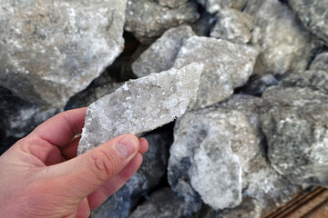 natural rock salt extracted from underground, close-up view of a large piece of rock salt,
