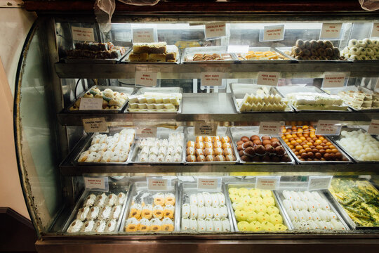 Lots of sweets in a display case in India