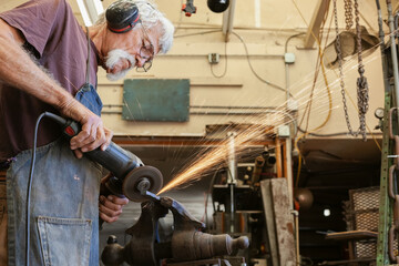 Artist Grinding Metal