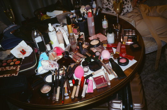 Table with different types of cosmetic stuff indoors 