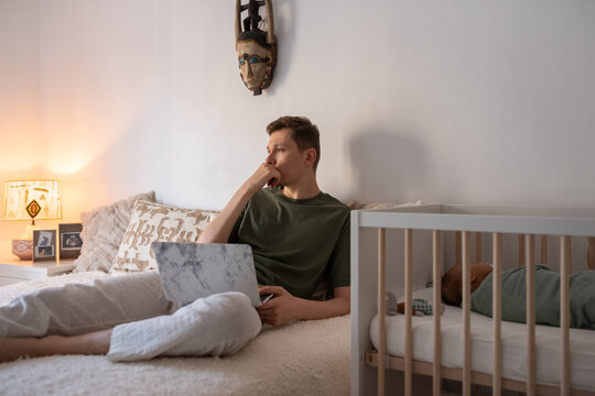 Man thinking deep while working at home