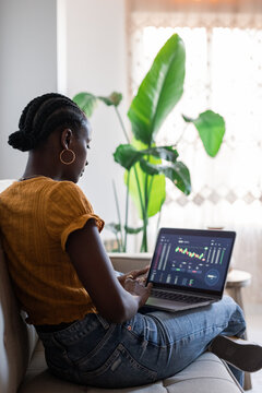 Woman trading at home