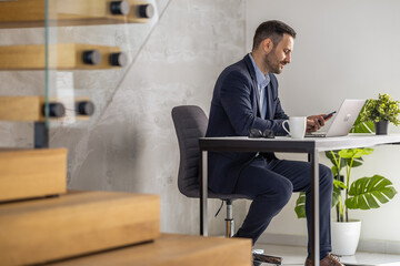 Professional Man Working in Modern Office Environment