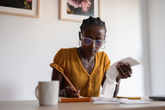 Woman counting expenditure 