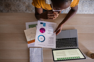 Woman analyzing financial report