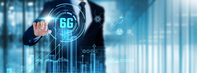 6G Technology: Businessman touches 6G technology analyzing graph ultra-fast connectivity, low latency, AI integration, smart cities, IoT expansion, real-time data, enhanced security, global coverage.