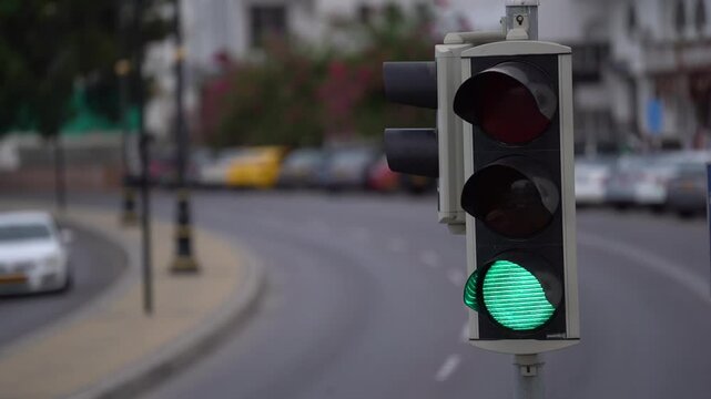 Traffic light semaphore changing from red to green
