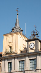 Detail of the clock on the wall of the town hall of Segovia (Spain)