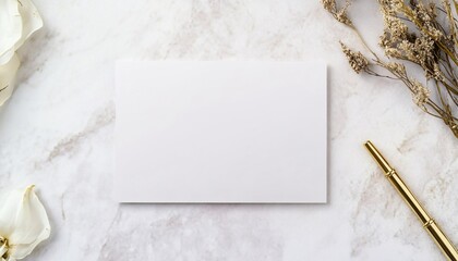 Elegant wedding invitation card mockup resting on a light grey marble background, showcasing modern design elements and a serene aesthetic perfect for wedding planning.