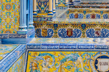 Old historical Andalusian town Seville, Spain. View on architectural details and ceramic tiles of...
