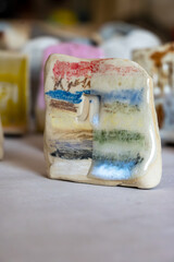 Samples of ceramic art objects and tabelware during workshop in art ceramic atelier in Poland