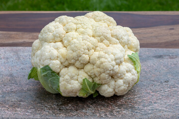 Healthy vegetarian food concept, raw cauliflower white cabbage ready for cooking