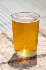 Spanish beer and bowl with green andalusian olives served on outdoor roof terrace with view on central part of old Sevilla, Andalusia, Spain