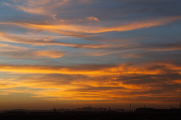 Beautiful , luxury soft gradient orange gold clouds and sunlight on the blue sky perfect for the background