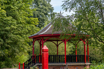 Ornate wooden gazebo or pagoda in a public park