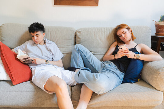 LGBTQ Couple sitting at home