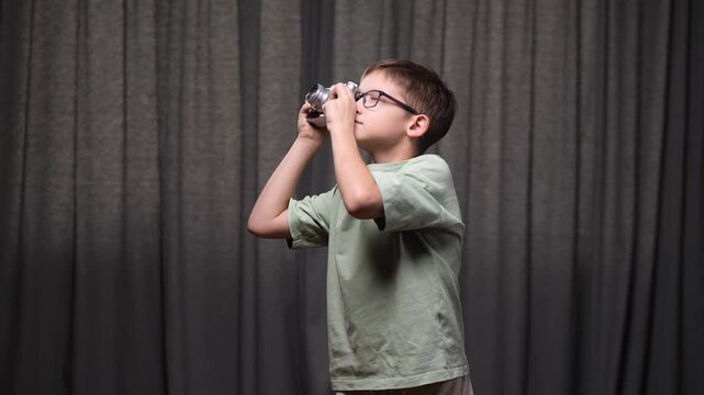 Young boy photographer capturing memories with vintage rangefinder camera