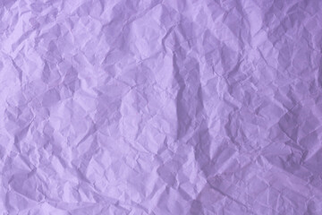 Fototapeta premium The texture of the background is made of crumpled lilac paper