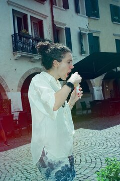 A woman in Italy with an ice cream