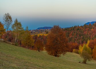 Fototapeta premium Autumn hills with vibrant foliage