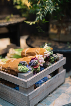 Freshly picked colorful flowers wrapped in paper