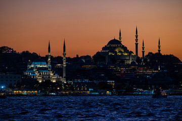 Sunset over Istanbul Blue mosque and Hagia Sophie seen from the Asian side