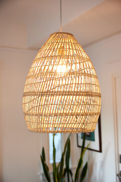 Wicker pendent light in cottage home