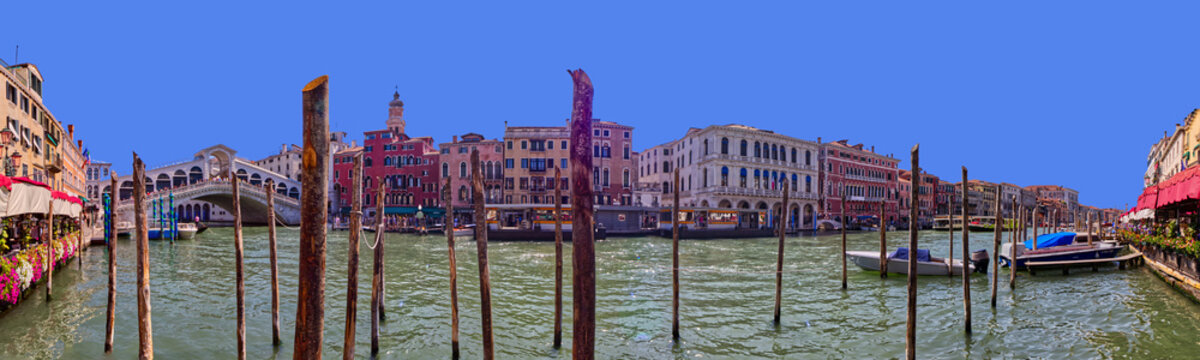 Panoramic view of the traditional gandolas and buildings by the main canal, Venice, Italy